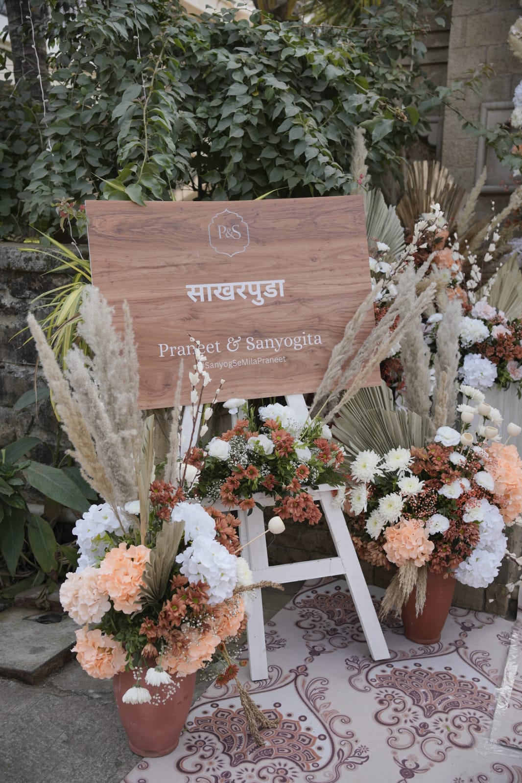 Roka easel signage with pampas