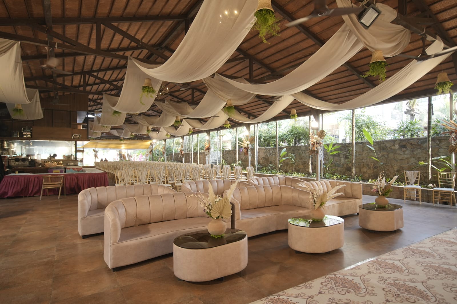 Draped ceiling lounge with cream sofas